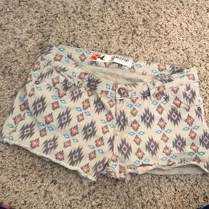 Cute tan tribal-patterned shorts from Grane™️.